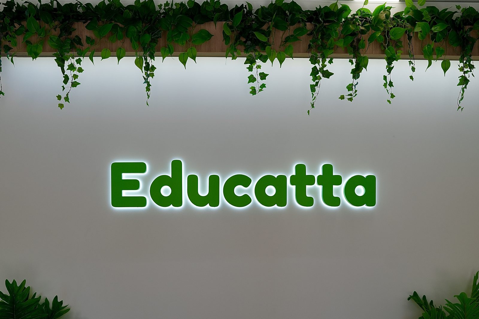 Educatta sign and greenery in the Bentley centre reception